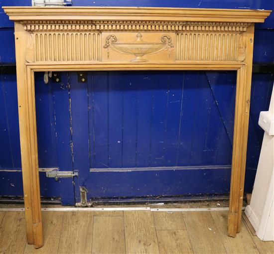 An Adam style pine fire surround W.134cm